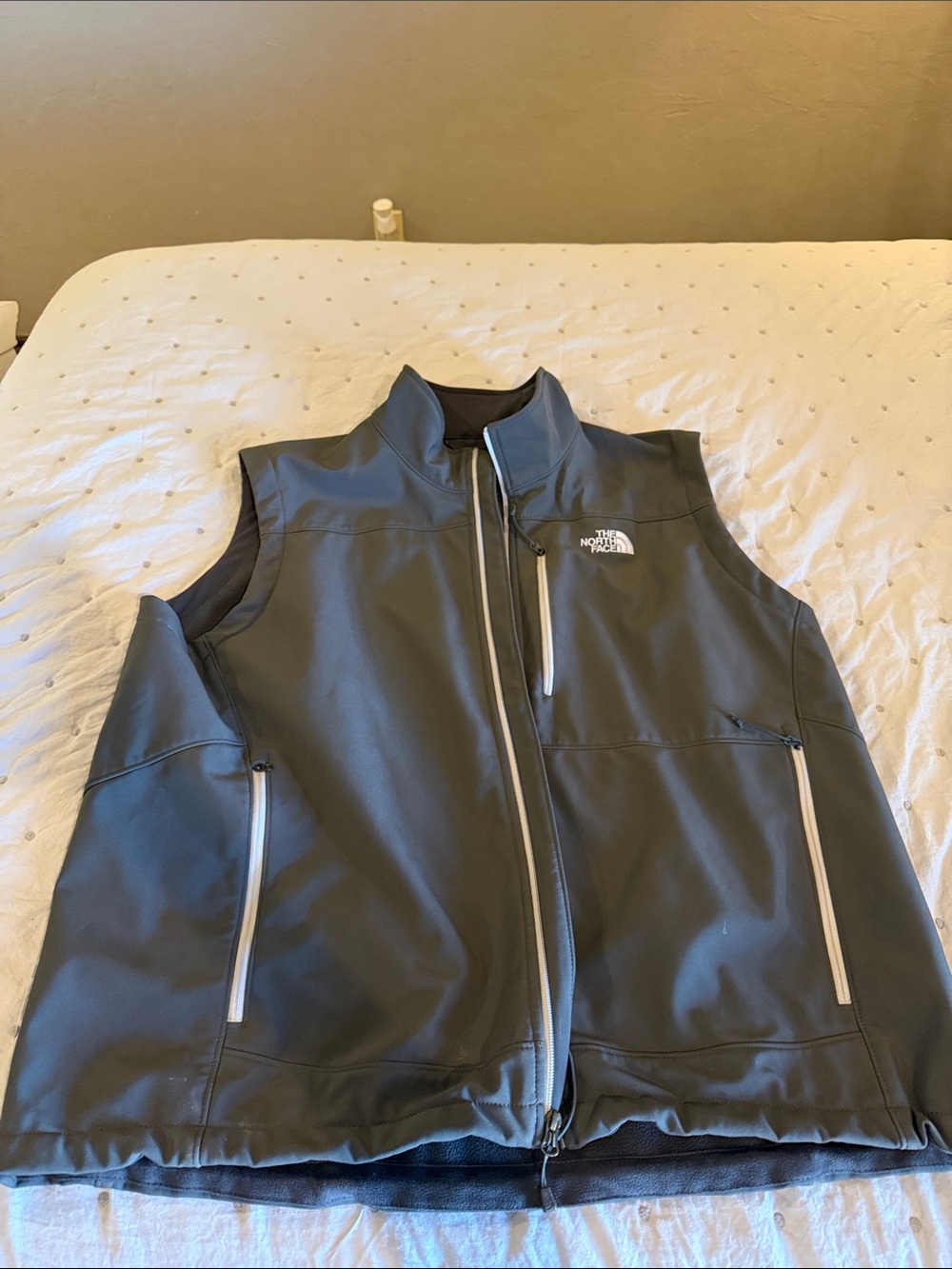 The North Face Men's Charcoal Softshell Vest with White Zippers